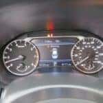 Car odometer showing mileage at All Right Auto Sales