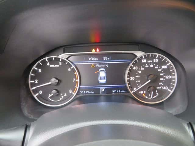 Car odometer showing mileage at All Right Auto Sales