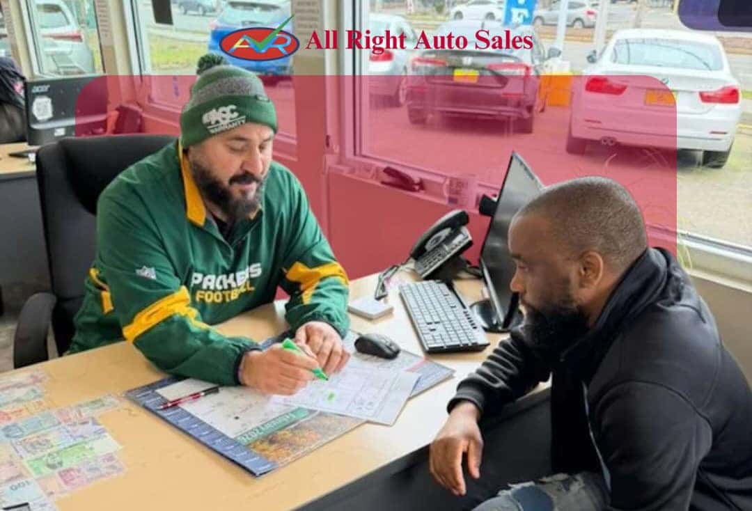 All Right Auto Sales team member assisting a customer in Federal Way, WA