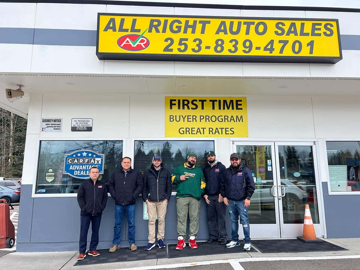 Team members of All Right Auto Sales ready to assist customers with their vehicle needs.