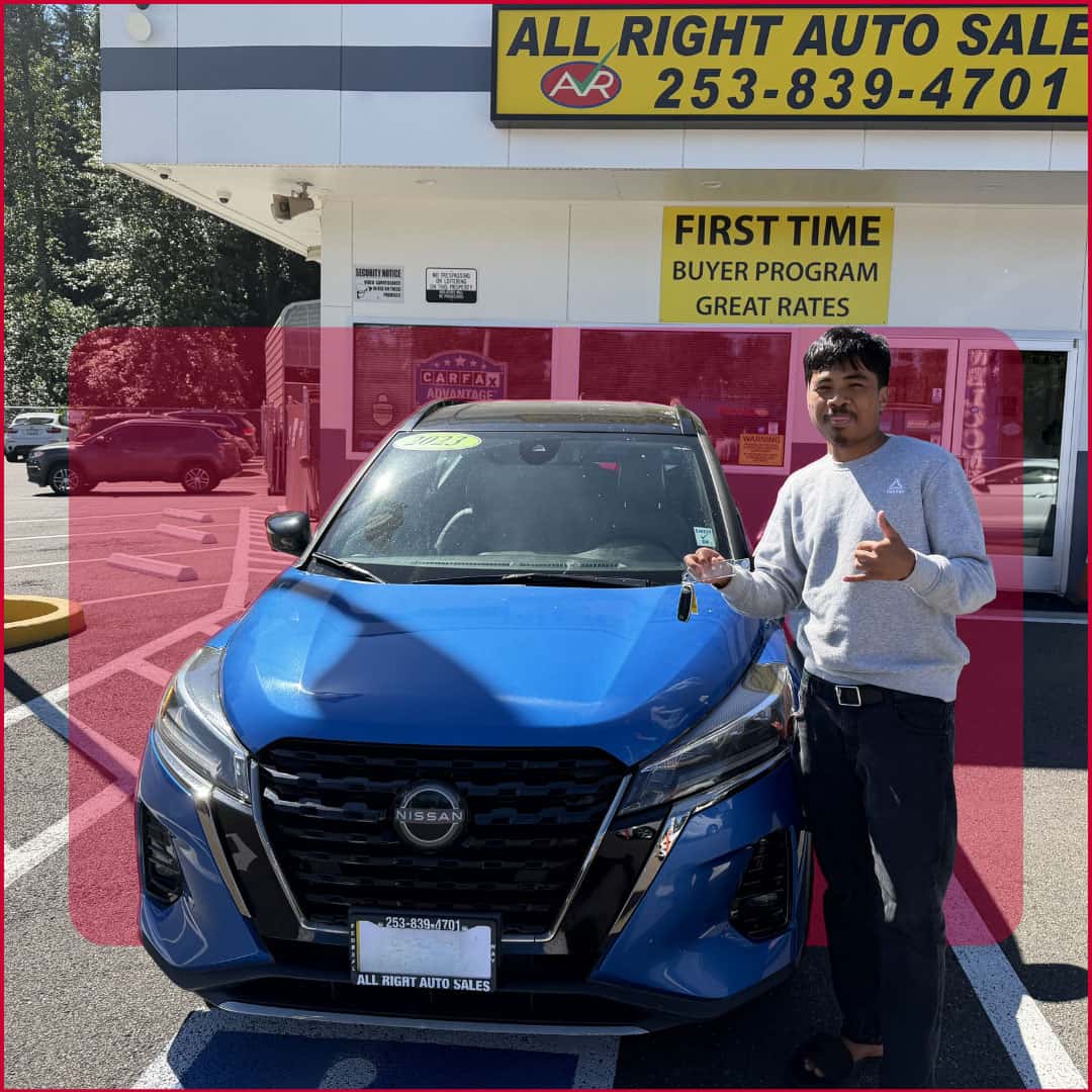 Happy customer with a new fuel-efficient vehicle from All Right Auto Sales