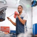 Hyundai Service technician working on a car
