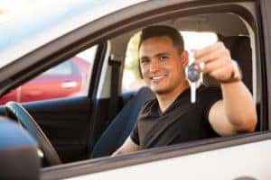 Man with new car