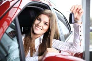Woman holding car keys