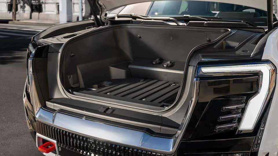 2026 GMC Sierra EV MultiPro Midgate and storage at Blasius GMC in Branford, CT