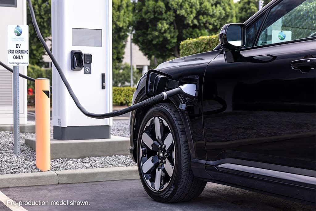 2024 Honda Prologue EV in black being charged 