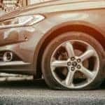car with front flat tire