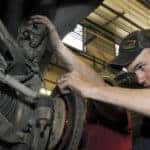 mechanic working on brakes