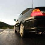 black car on road brakes