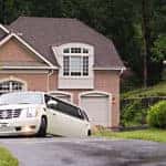 white SUV limo driving