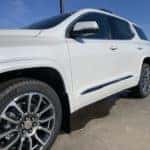Front left side of a white GMC