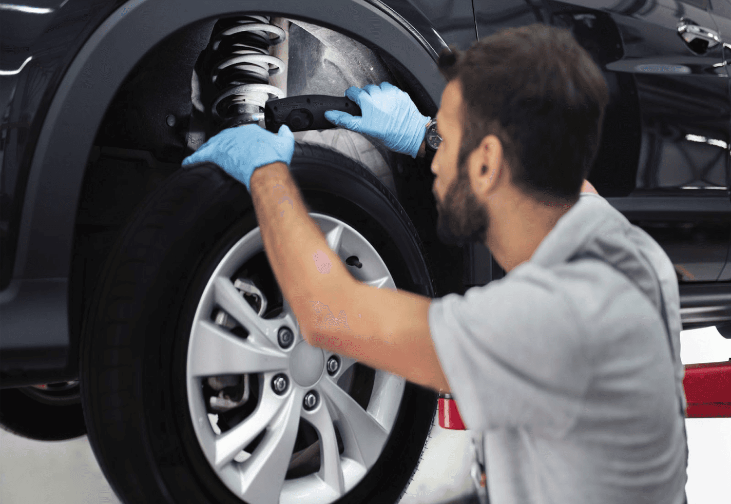 mechanic working on shocks in youngstown, ohio