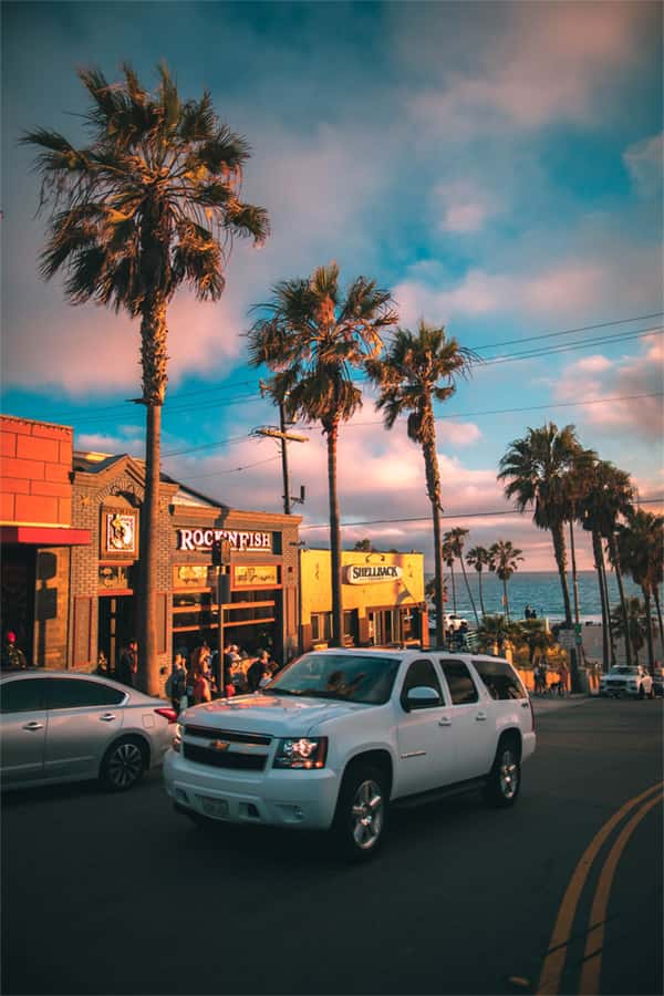 Chevrolet Tahoe driving at sunset
