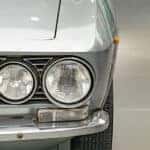 headlights on a gray car