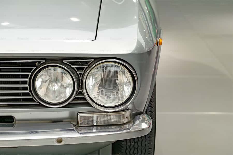headlights on a gray car