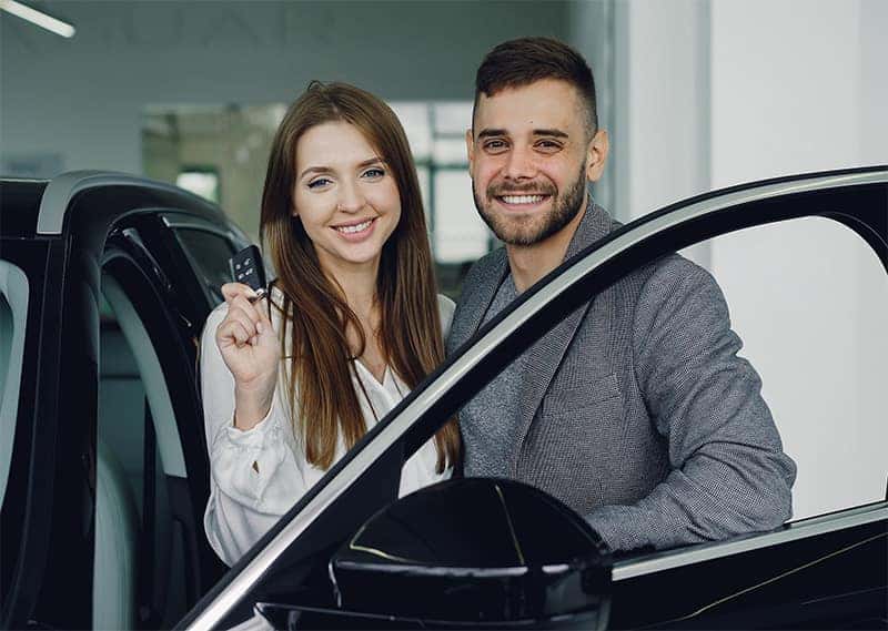 Couple buying a car
