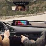 A woman and man inside a 2021 Mazda CX-30 | El Dorado Mazda in McKinney, Texas