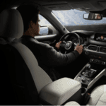 A man driving a 2019 Mazda CX-5 | El Dorado Mazda in McKinney, Texas
