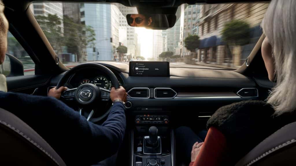 Couple driving in a 2025 Mazda CX-5
