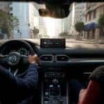 Couple driving in a 2025 Mazda CX-5