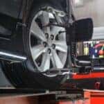 Mechanic is racine, wi performing a wheel alignment