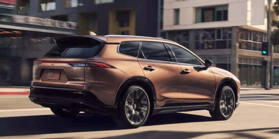 bronze color vehicle in city