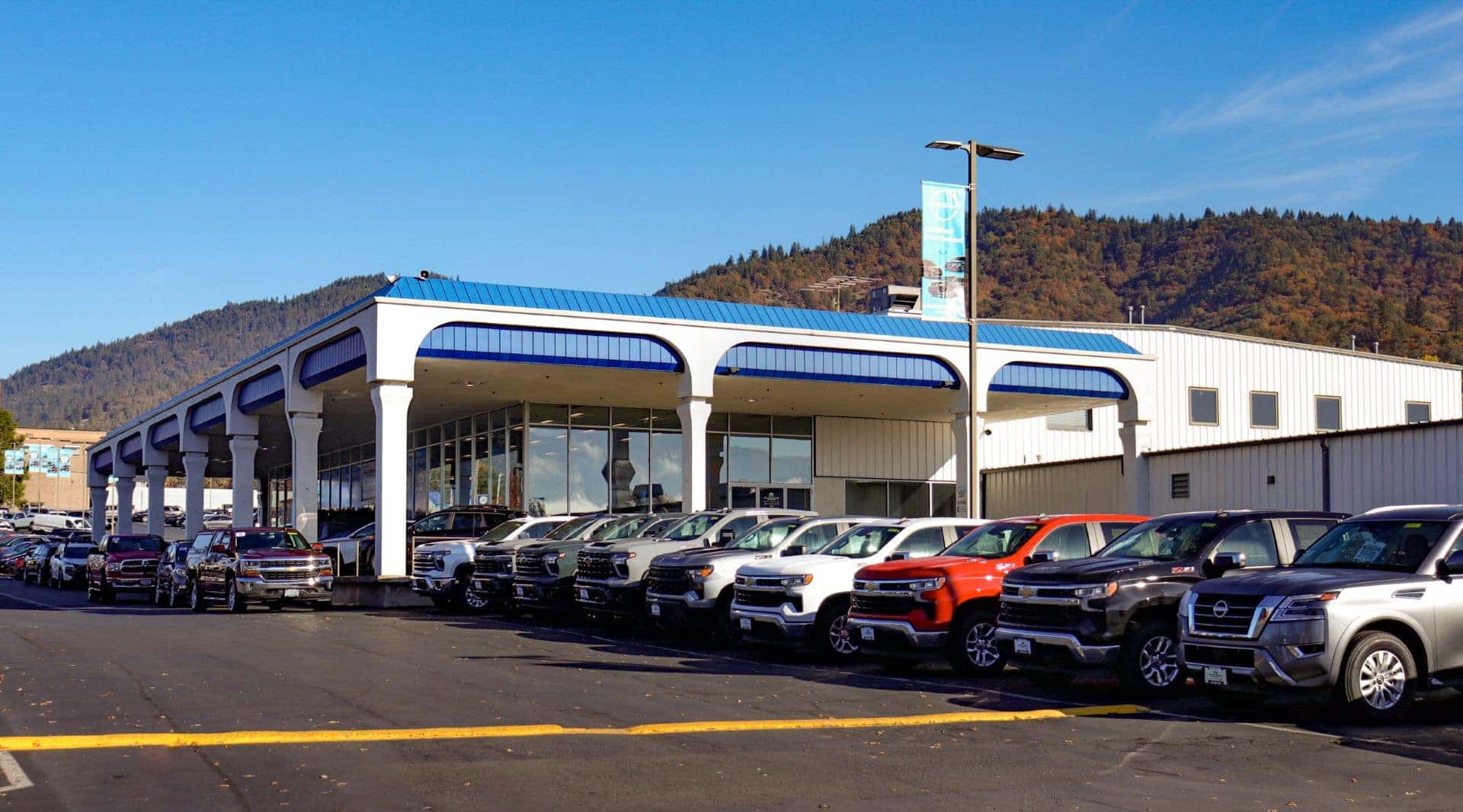 Row of Chevrolet Trucks and SUV's in front of Grants Pass Chevrolet