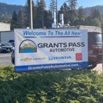 A banner advertising Grants Pass Automotive