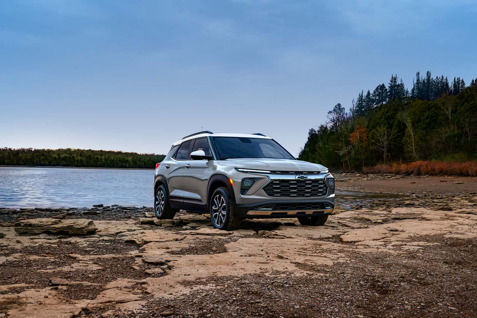 A used Chevrolet SUV parked near a lake