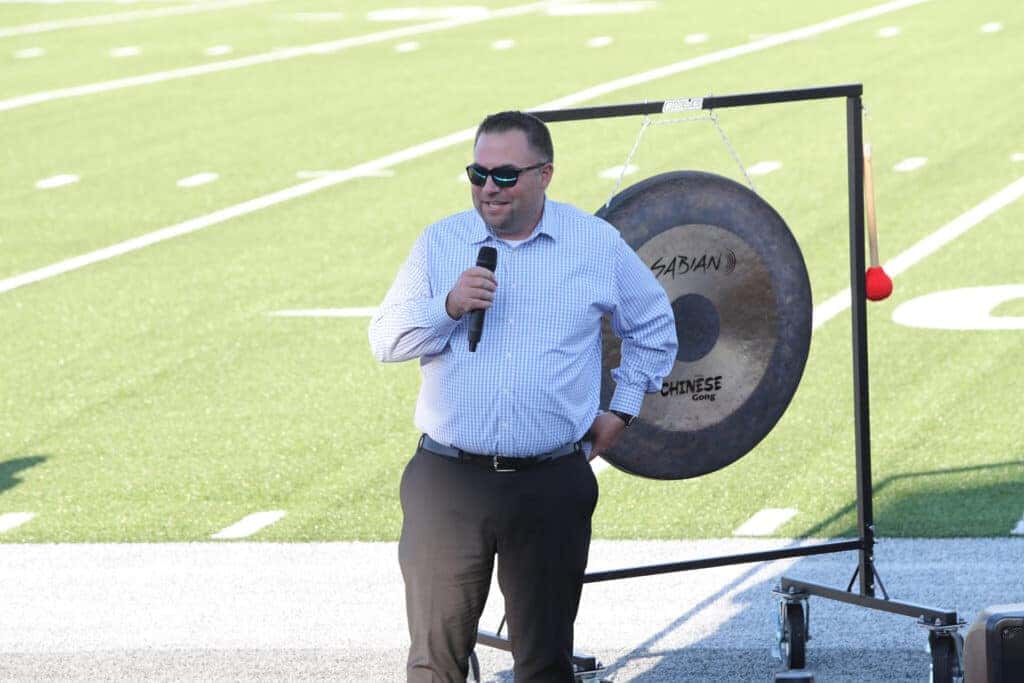 Michael Shannon Jr speaks at the dedication of the National Exchange Bank Field in Fond du Lac, WI