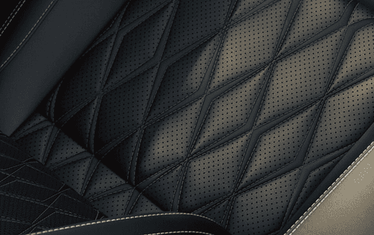 Close-up of Rogue diamond-quilted leather seat stitching