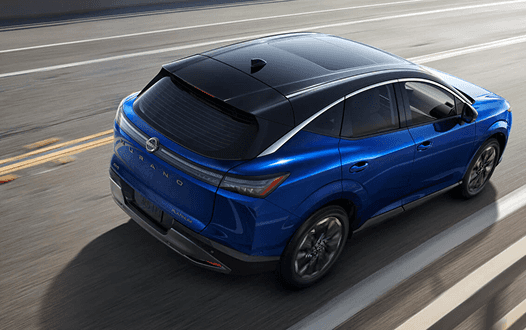 Overhead rear view of a blue Murano with black contrast roof on the highway