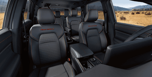 Pathfinder Rock Creek interior with orange-stitched front and rear seats