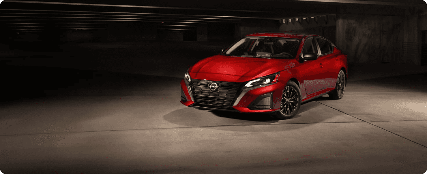 Red 2026 Nissan Altima SV Special Edition in showroom
