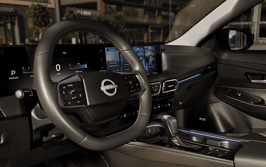 Sentra driver cockpit with steering wheel and dual digital displays