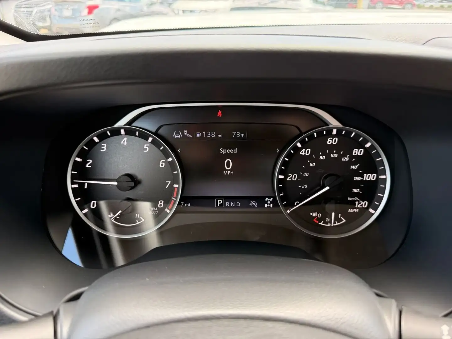 Close-up of the 2026 Nissan Frontier digital and analog gauge cluster