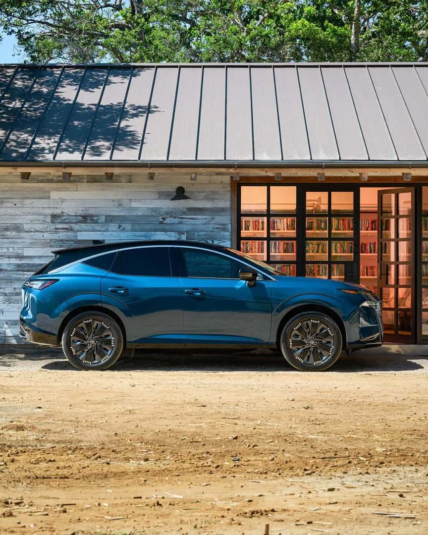 Nissan Murano driving on an open rural road