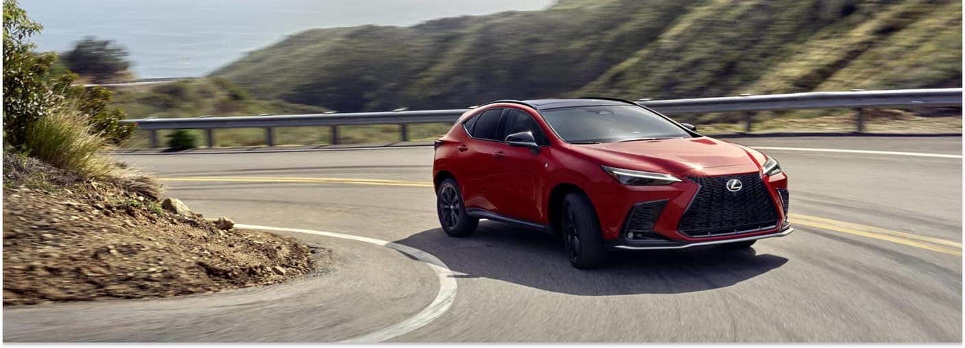 Red 2026 Lexus NX Driving on Road