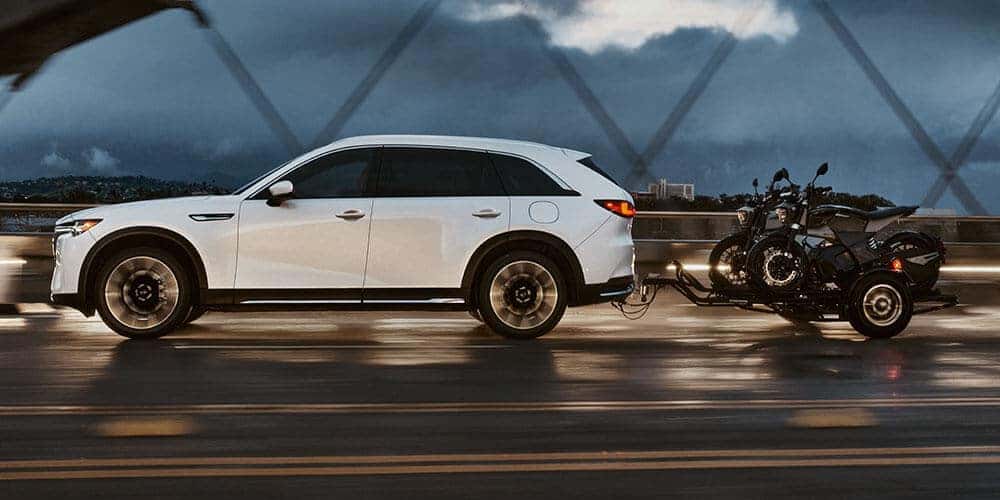 2025 Mazda CX-90 in St. Louis towing two Motorcycles