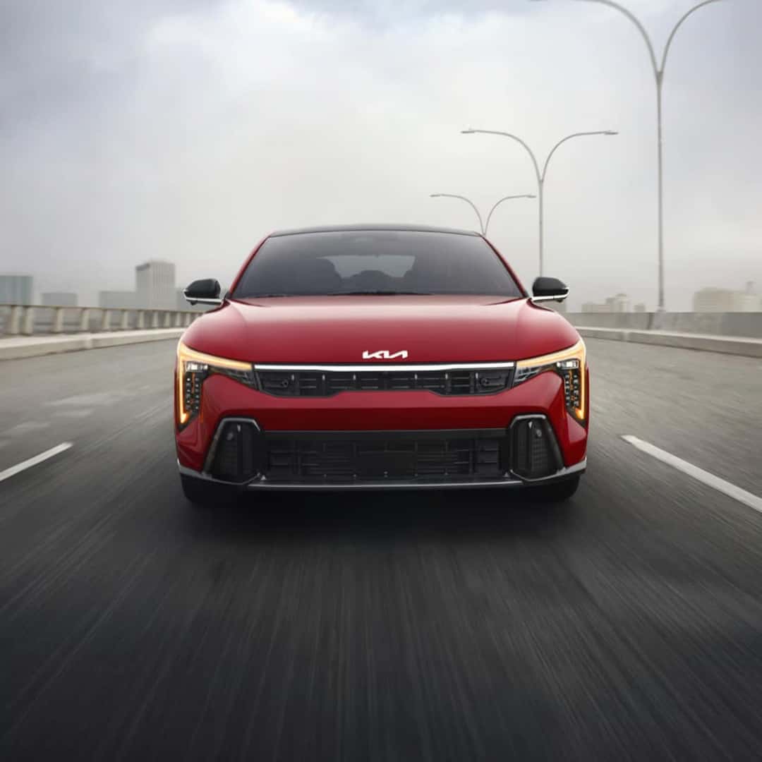 2026 Kia K4 GT-Line driving on the road