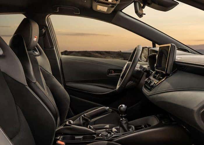 2025 Toyota GR Corolla Interior – Driver-Focused Cockpit with Sport Seats, GR Badging, and Racing-Inspired Design