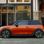 Orange MINI Cooper parked