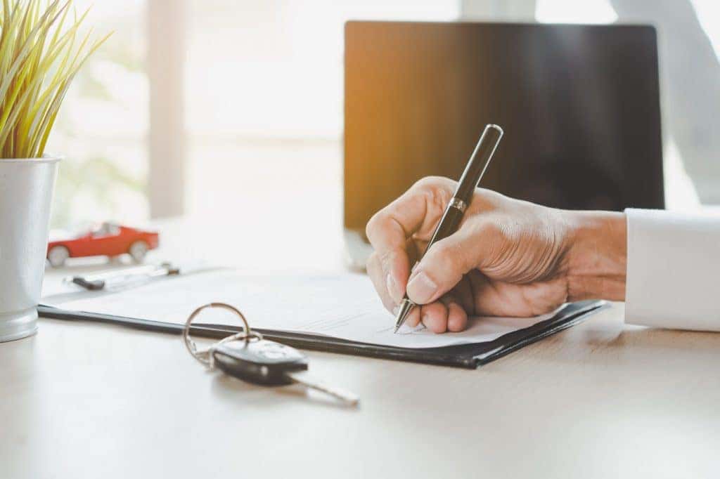 Signing vehicle loan contract