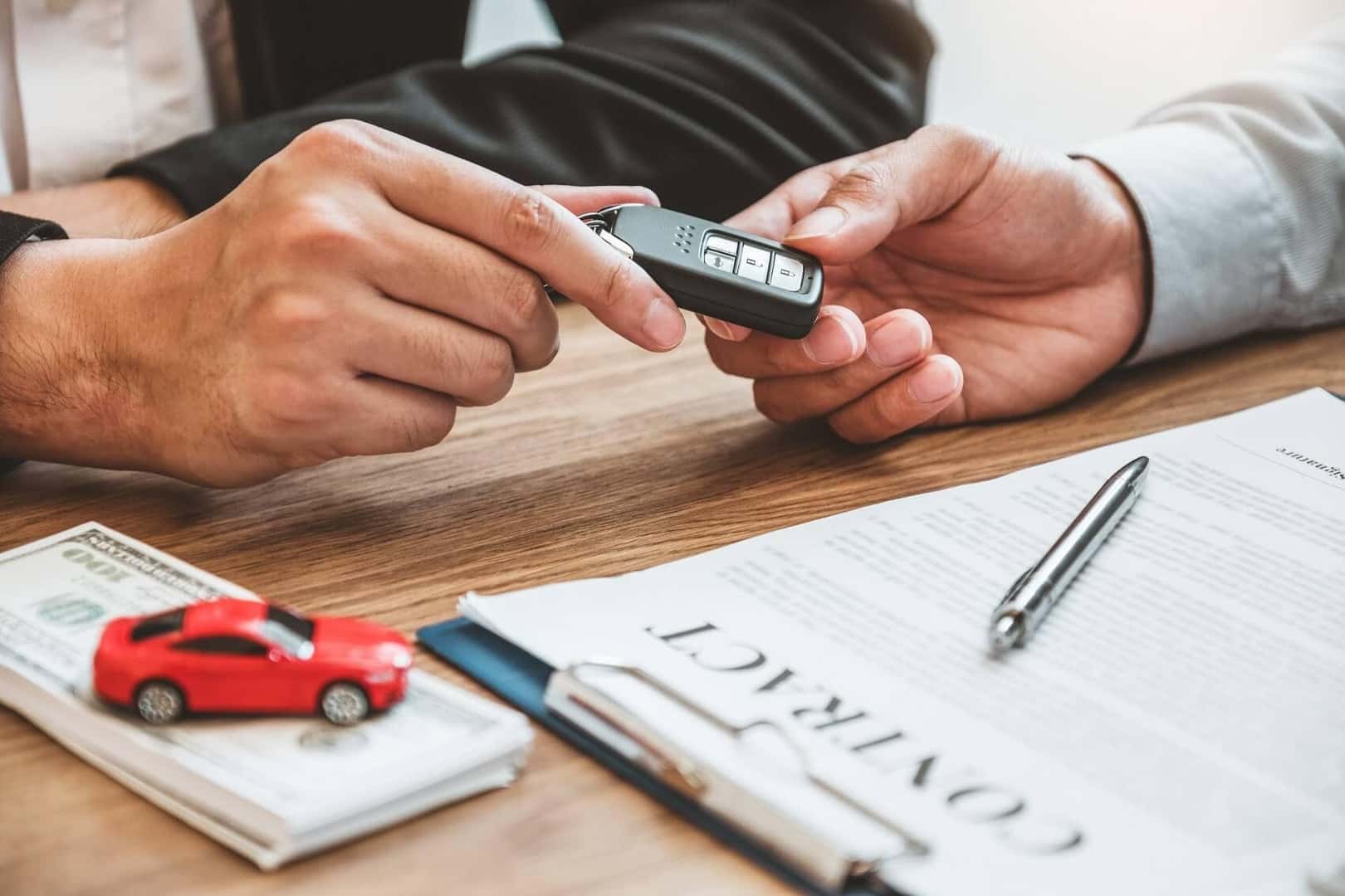 Handing Car Keys over to Customer