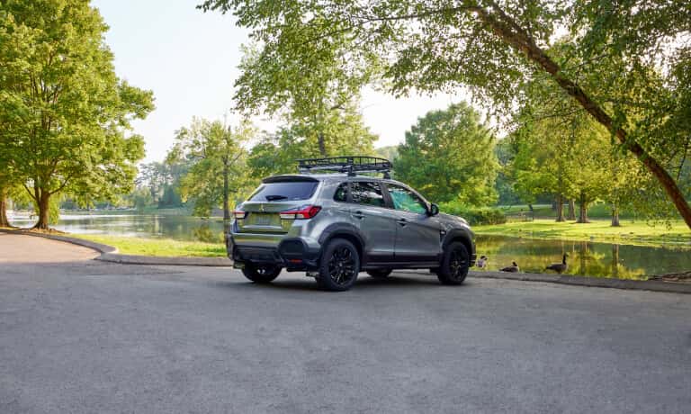 2026 Mitsubishi Outlander Sport parked by lake