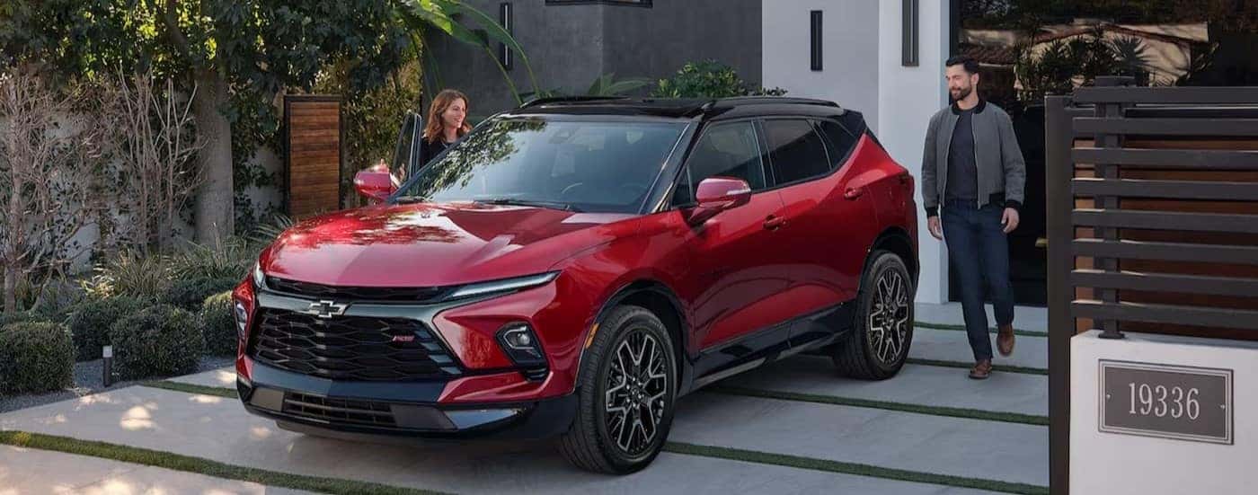 A 2024 Chevy Blazer RS is shown parked on a driveway.