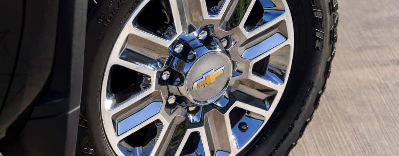 A close-up on the wheel of a 2024 Chevy Silverado 2500 HD High Country.