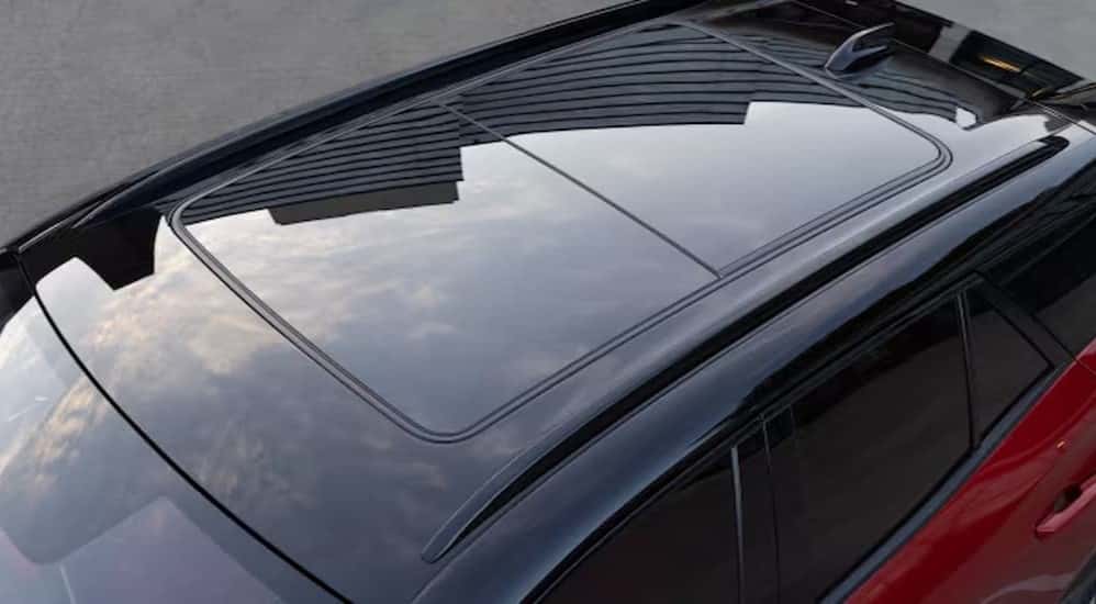 A close-up of the sunroof is shown on a 2025 Chevy Blazer EV RS.