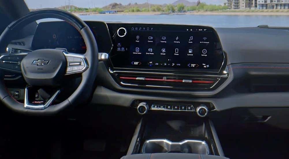 The black dashboard is shown in a 2025 Chevy Silverado EV for sale.