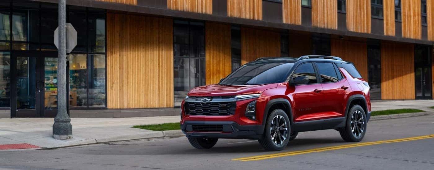 A red 2025 Chevy Equinox for sale from the front.